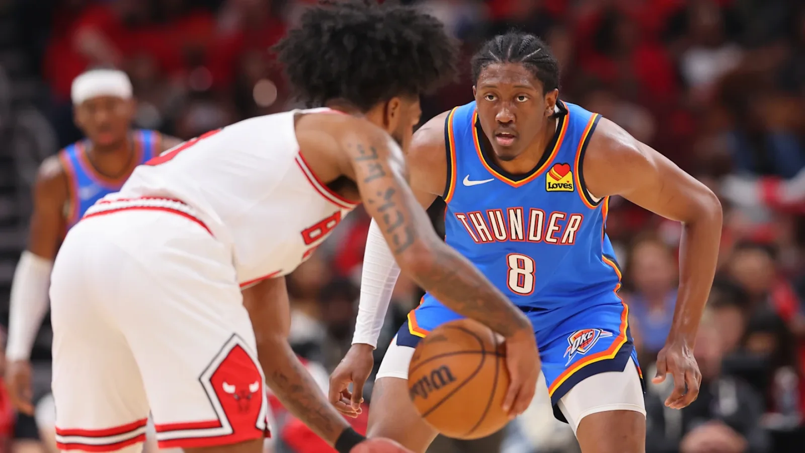 Shai Gilgeous-Alexander handling the ball against Phoenix as Oklahoma City defends a late lead