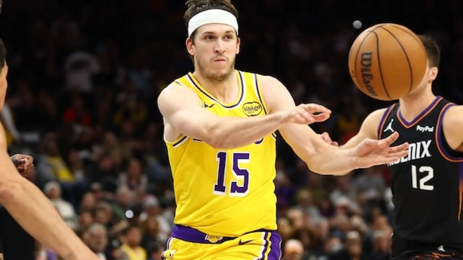 Austin Reaves in Los Angeles Lakers game action, horizontal 16:9